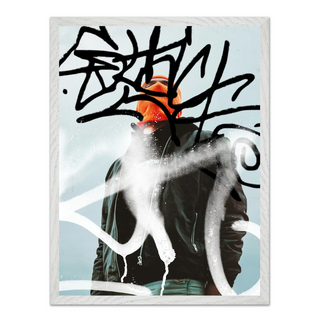 Urban photography of man wearing an orange beanie and black jacket with abstract art graffiti elements on a light blue background. Displayed in a white
wooden frame.