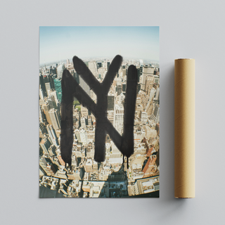 Framed urban artwork featuring New York graffiti over a cityscape, displayed next to cardboard tube roll packaging.