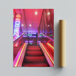 Vibrant urban wall art print of a neon-lit staircase with colorful lights and signage, designed for modern city interiors and displayed next to cardboard tube packaging.
