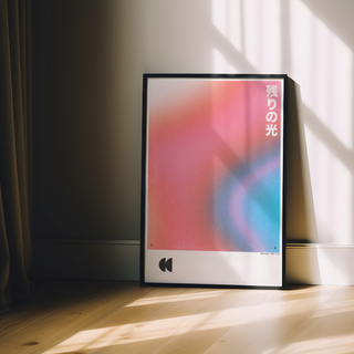 Framed graphic design print with Japanese text on a white background and a red, pink, and blue gradient, displayed in a premium black wooden frame.