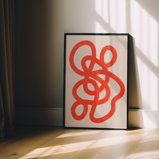 Abstract minimalist print featuring bold red lines on a beige background, displayed in a premium black wooden frame.