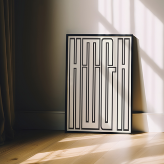 Bold black and white typography poster featuring the word 'HIGH' filling the entire page, presented in a premium black wooden frame.