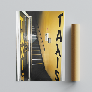 Urban 35mm film photograph of a taxi service front door with an edgy street art aesthetic, displayed next to brown cardboard tube packaging. 