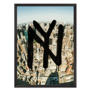 Framed urban artwork featuring New York graffiti over a cityscape, displayed in a premium black wooden frame.