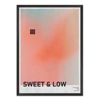 Urban typography poster with gradient peach design and text 'SWEET & LOW'. Displayed in a black wooden frame. 