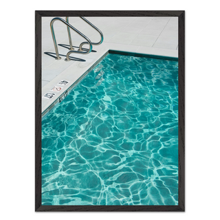 Framed photograph of a turquoise blue pool with clear blue water, in premium wooden black frame. 