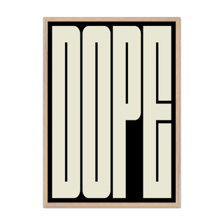 Bold typography poster of cream wording 'DOPE' on black background displayed inn a premium wooden oak frame. 