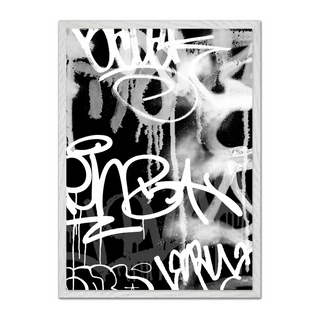 Black, white and grey graffiti  spray paint abstract art print with graffiti-style text displayed in a white wooden frame. 