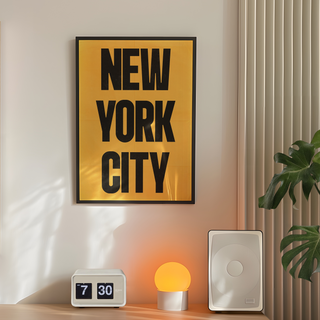 Urban New York poster with black text  'New York City'  on a yellow background. Displayed in a premium wooden black frame. 