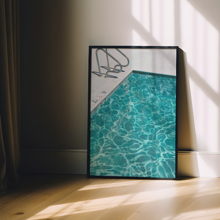 Framed photograph of a turquoise blue pool with clear water, displayed in a premium black wooden frame.